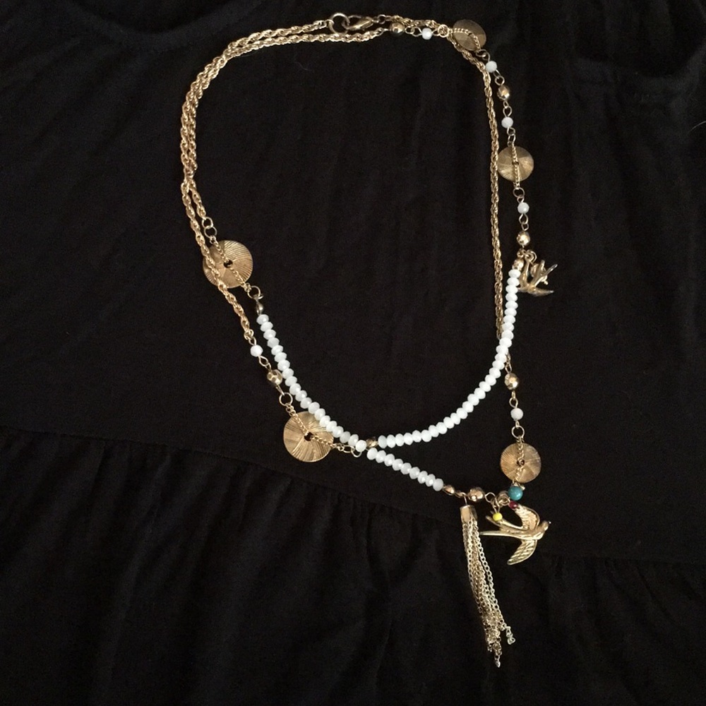 Gold bird necklace